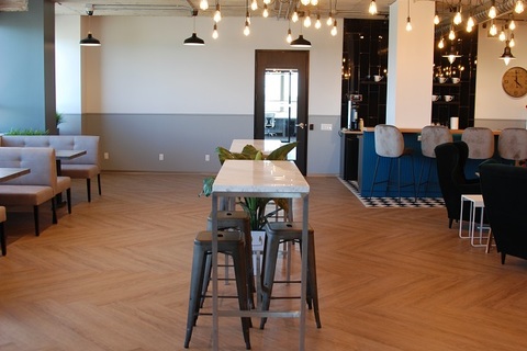 a room filled with furniture and a wood floor