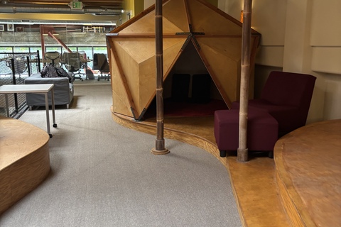 a room with a large triangular structure