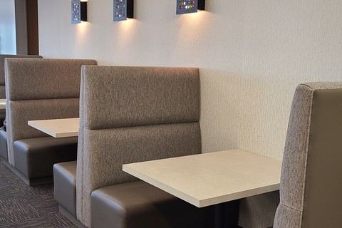 a chair sitting in front of a table