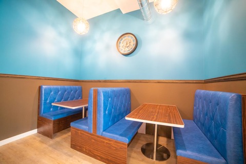 a blue chair in a room