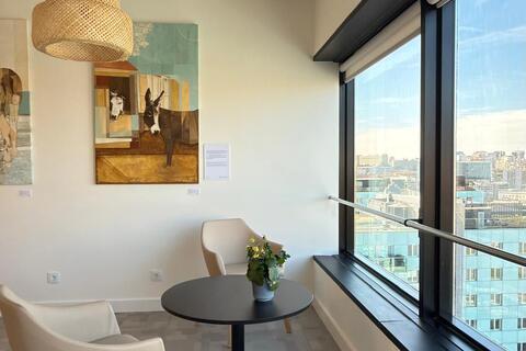 a room with a table and chairs