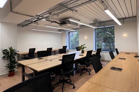 a room with a table and chairs