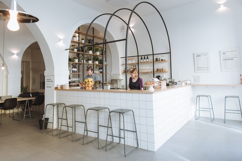 a kitchen with a table in a room