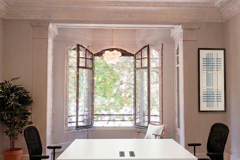 a room with a table and chairs