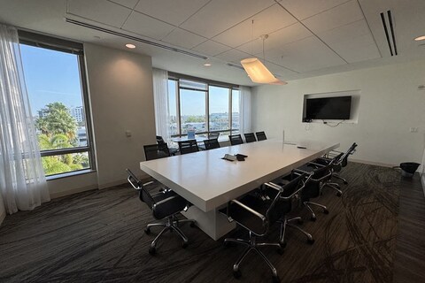 a room with a table and chairs