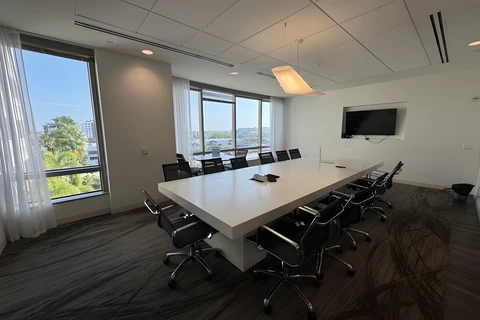 a room with a table and chairs