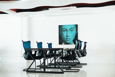 a person in a blue chair