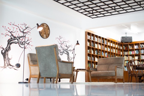 a room filled with furniture and a table