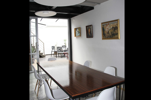 a room filled with furniture and a table