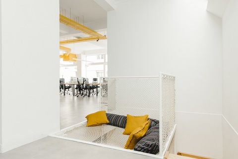 a bedroom with a bed in a room