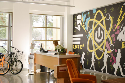 a bicycle next to a window