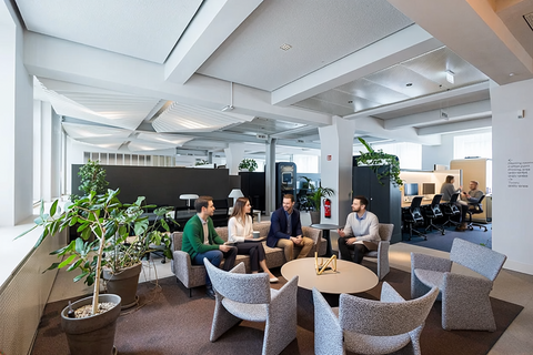 a group of people sitting in a room