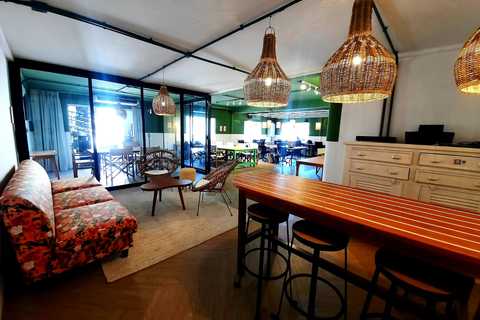 a living room filled with furniture and a table