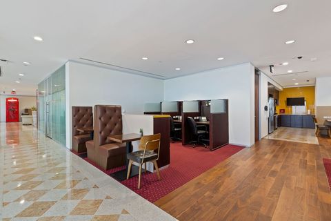 a room filled with furniture and a rug