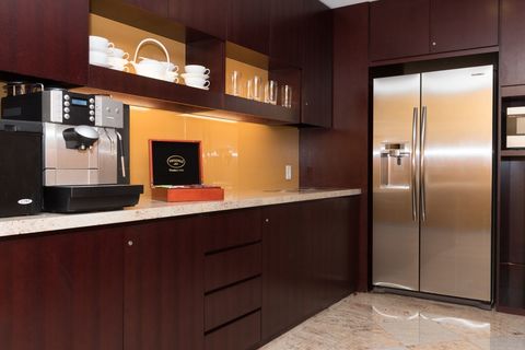 a modern kitchen with stainless steel appliances