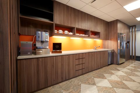 a large kitchen with stainless steel appliances