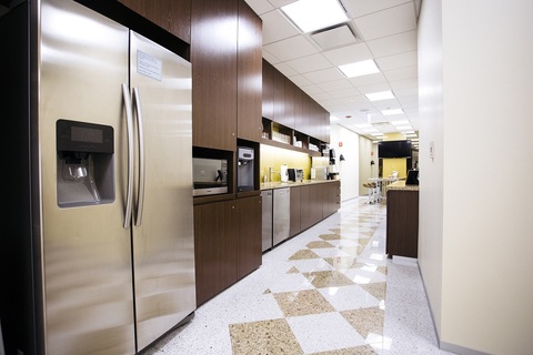 a stainless steel refrigerator in a kitchen
