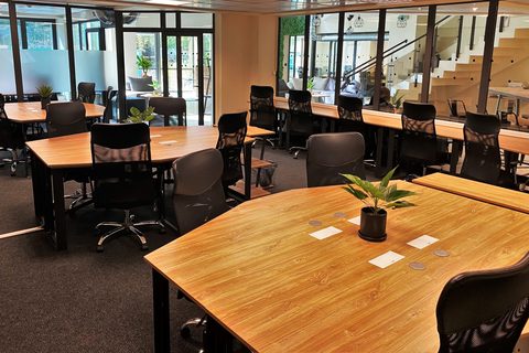 a room filled with furniture and a large window