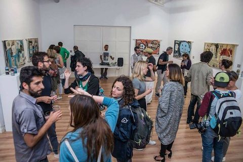 a group of people standing in a room