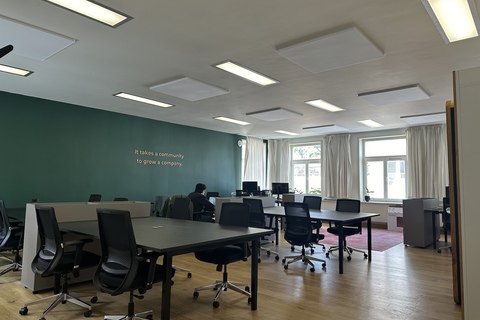 a large room with tables and chairs