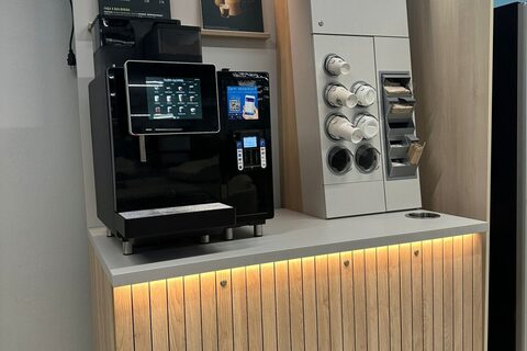a microwave oven sitting on top of a refrigerator