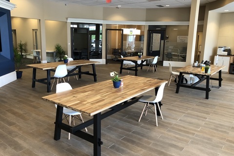 a room filled with furniture and a table