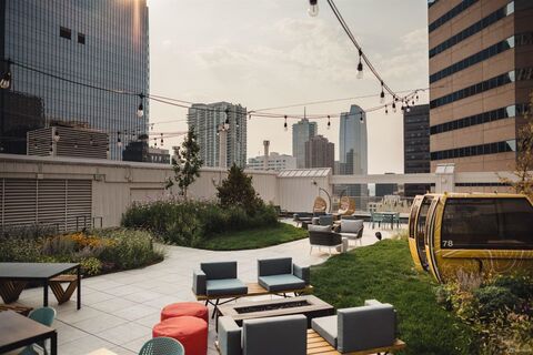 a chair sitting in front of a building