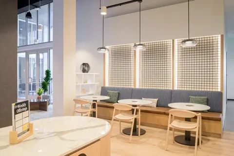 a room with tables and chairs