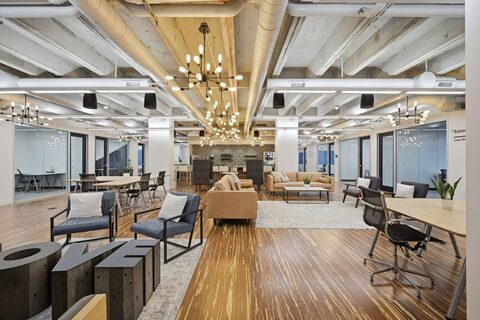 a room with a large table and chairs