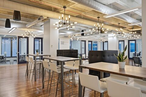 a room with tables and chairs
