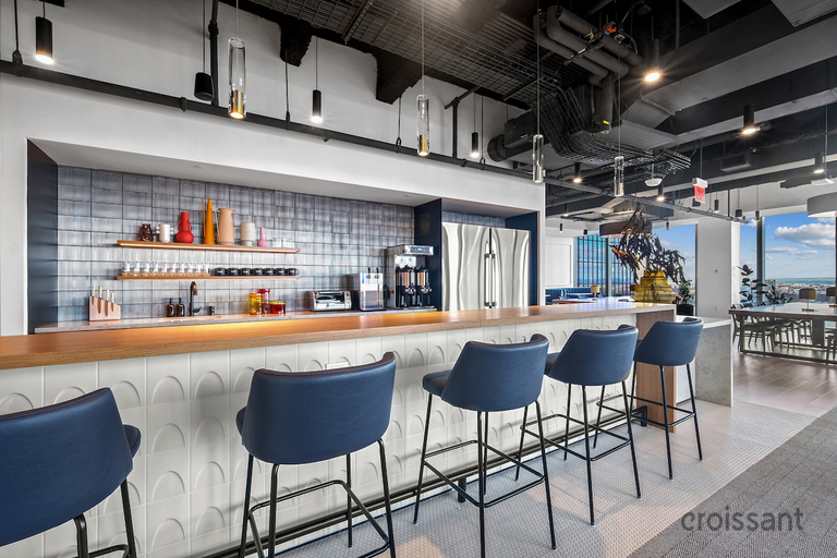 a room filled with furniture and a table in a restaurant