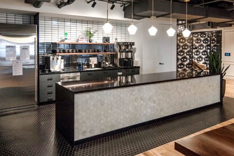 a modern kitchen with stainless steel appliances