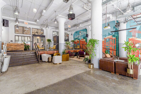 a room filled with furniture and a large building