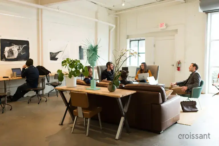 a group of people sitting in a room