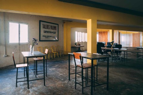 a dining room table in front of a window