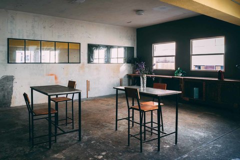 a room filled with furniture and a table