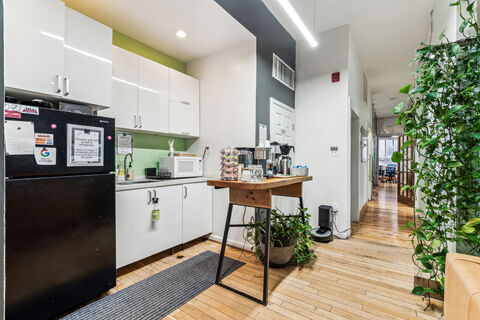 a kitchen with a large window