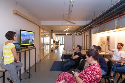 a group of people sitting in a room