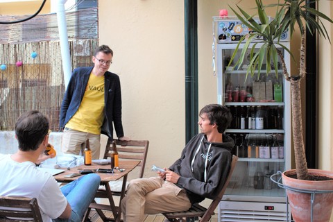 a group of people sitting at a table