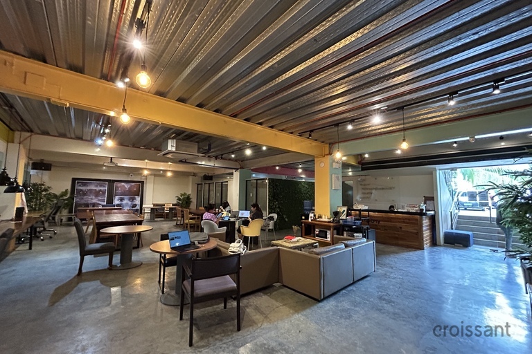 a room filled with furniture and a table