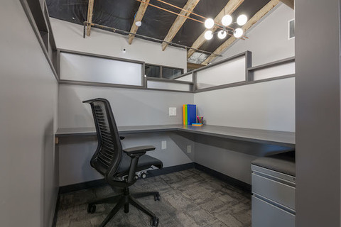 a kitchen with a sink and a window