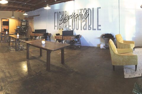 a room with a table and chairs