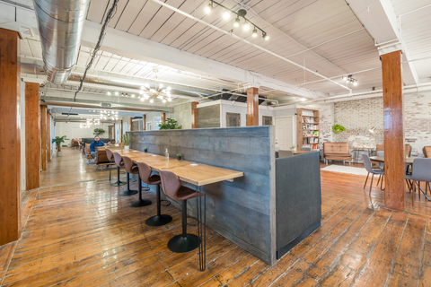 a room filled with furniture and a wood floor