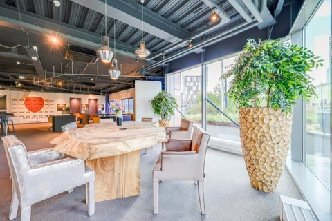 a room filled with furniture and a fireplace
