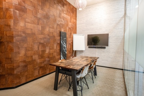 a living room with a wooden floor