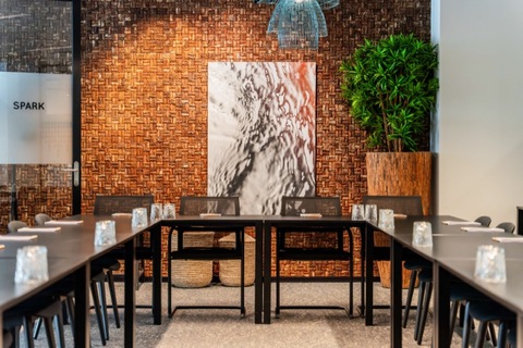 a dining table in front of a building