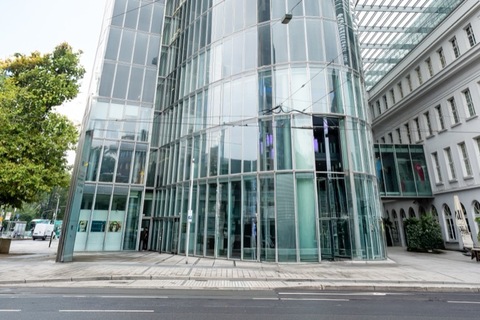 a close up of a street in front of a building