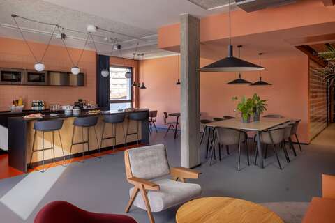 a living room filled with furniture and a table