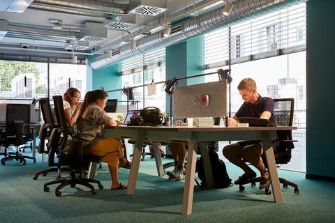 a group of people sitting at a table