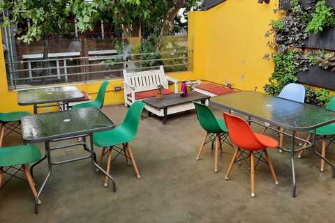 a green chair at a table